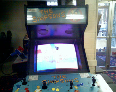 crappy mobile pic of Simpsons arcade game